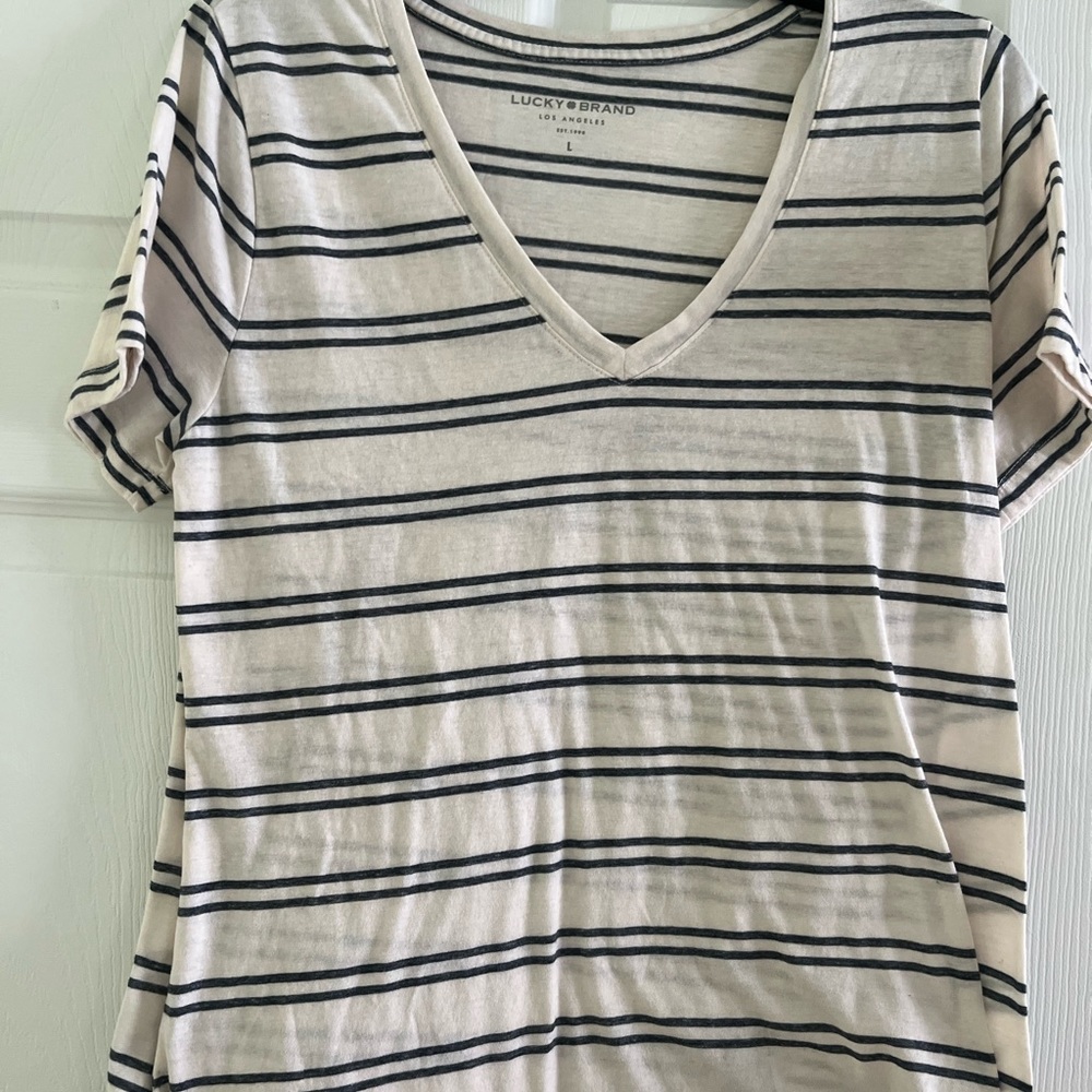 Lucky Brand striped t-shirt.  Light weight very chops condition size large